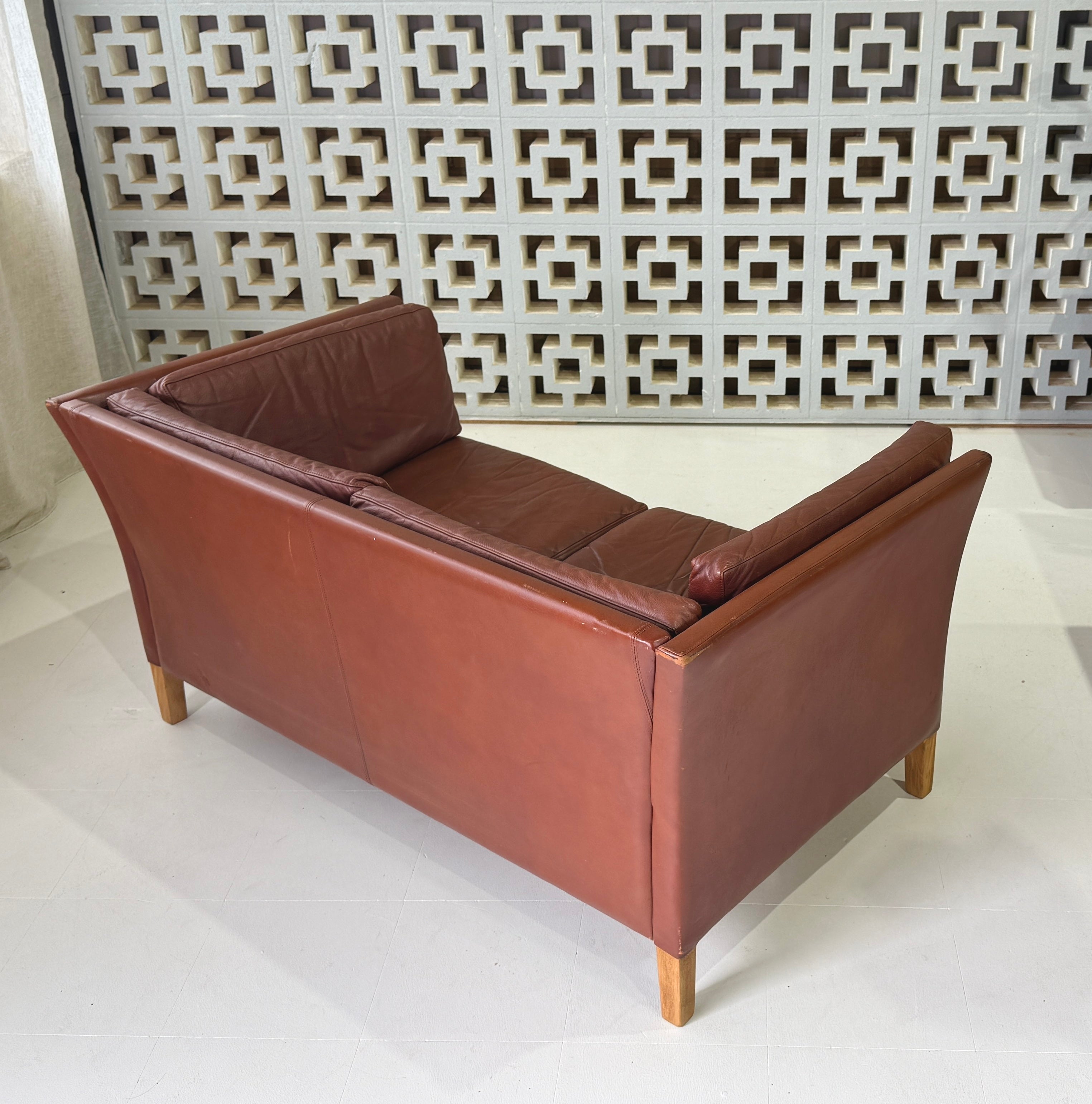 Danish Two Seater Sofa in a Blood Red Leather