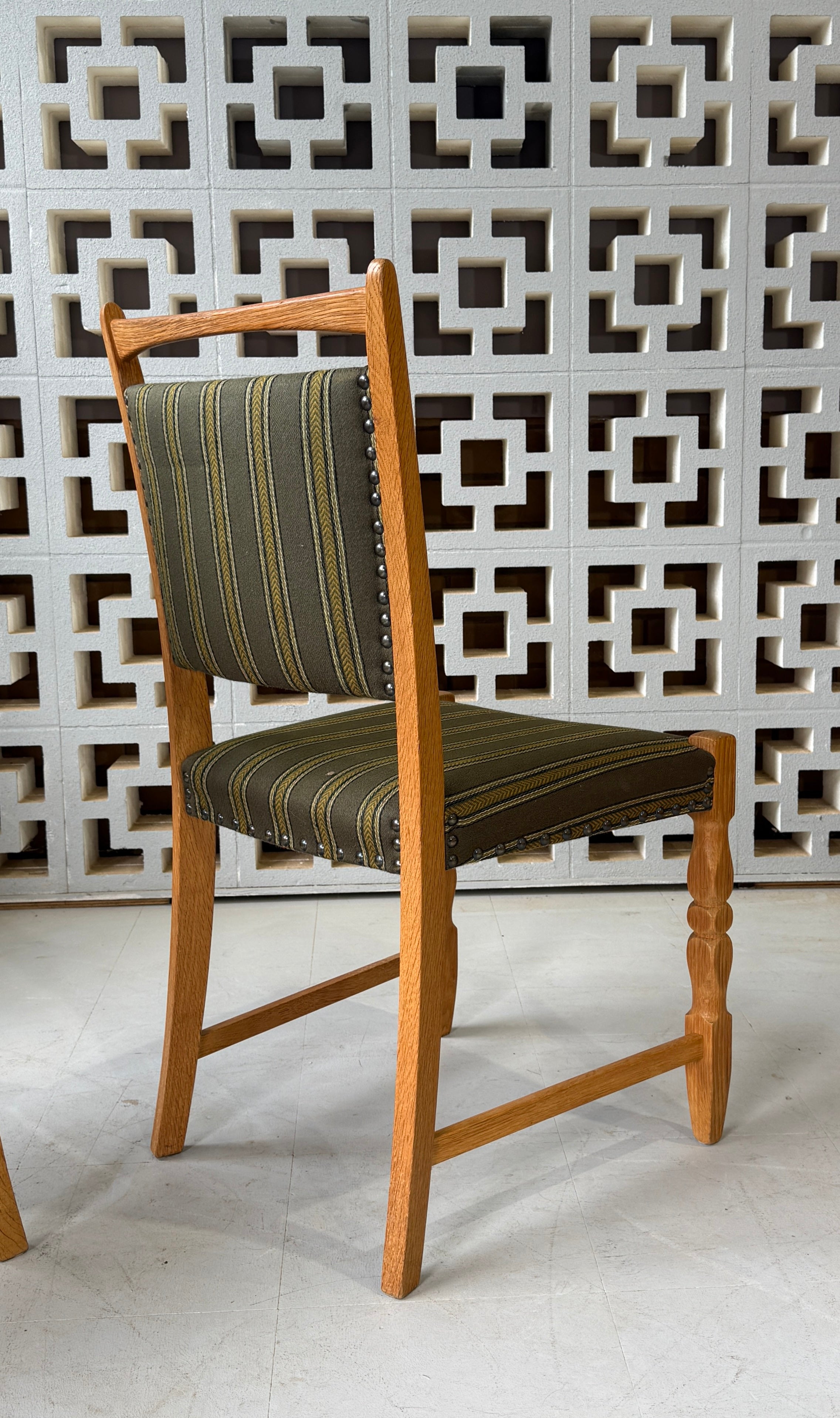 Six Henning Kjærnulf Dining Chairs in Oak
