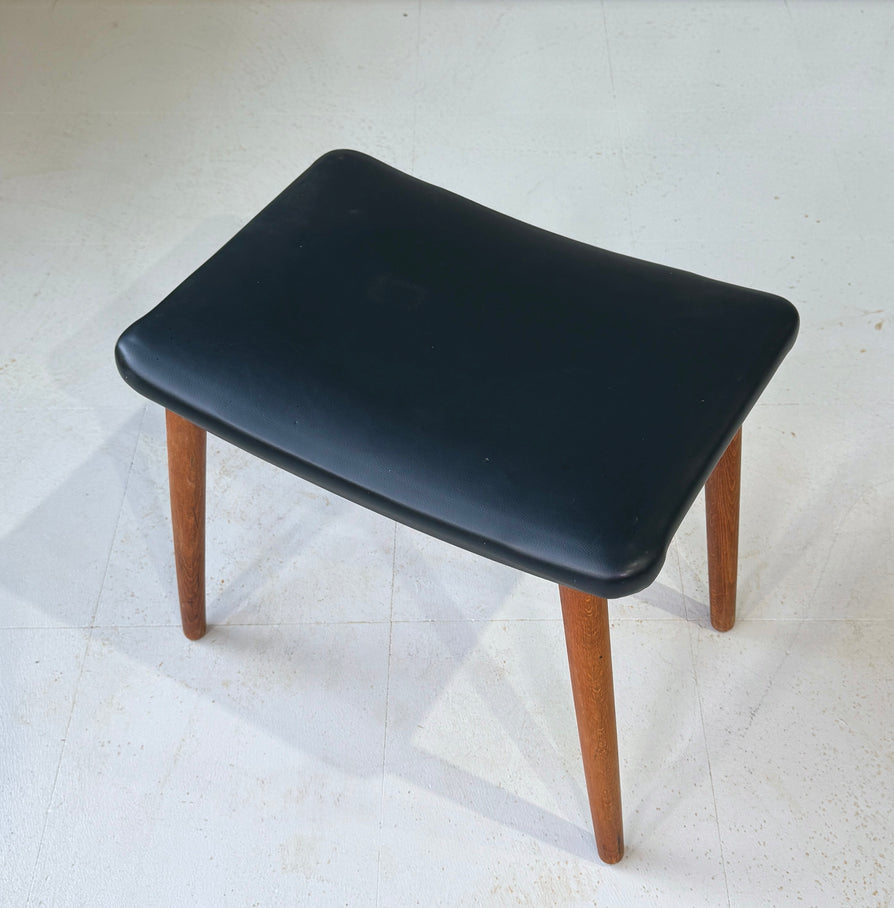Danish Footstool in Black Vinyl and on Teak Legs