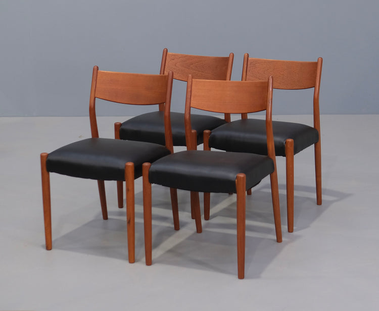 Four Danish "Spade-Back" Dining Chairs
