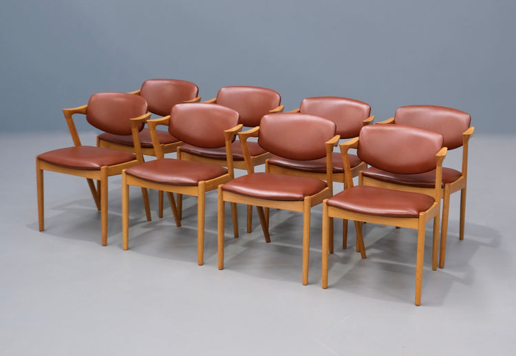 Eight Kai Kristiansen #42 Dining Chairs in Oak