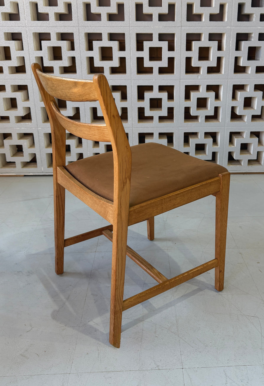 Four Erik Wørtz Dining Chairs in Oak