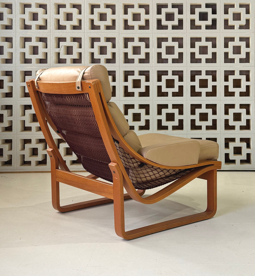 Tessa T4 Lounge Chair in a Light Tan Leather