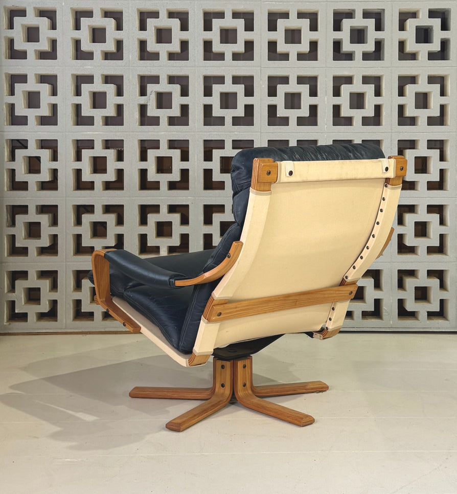 Tessa Stockholm Swivel Lounge Chair & Footstool in Blue Leather