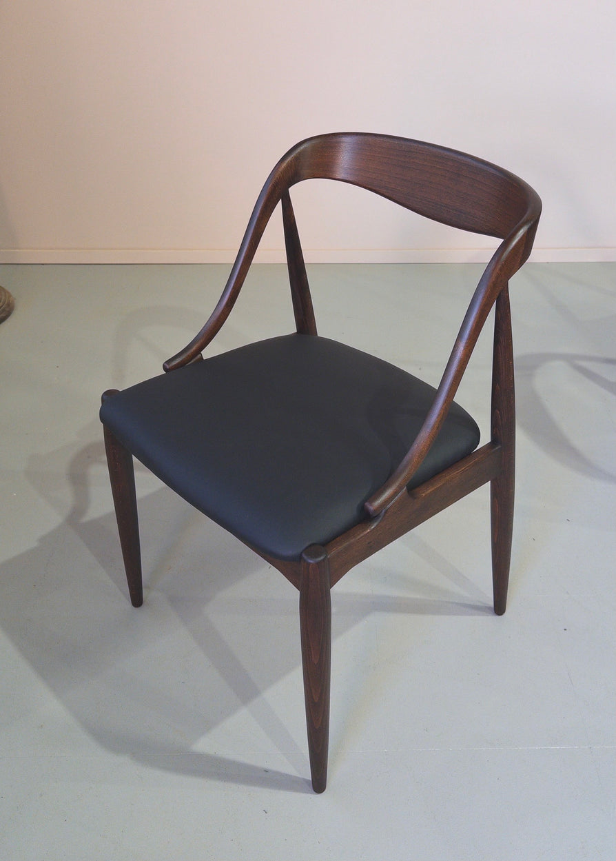 Four Johannes Andersen Model 16 Dining Chairs