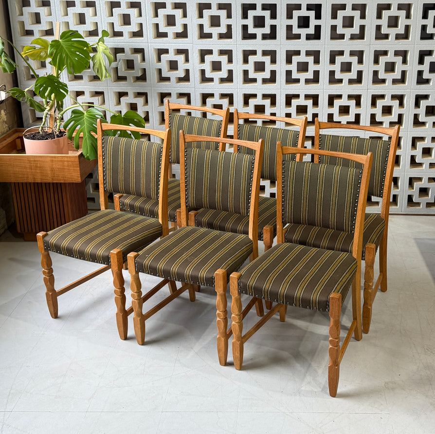 Six Henning Kjærnulf Dining Chairs in Oak