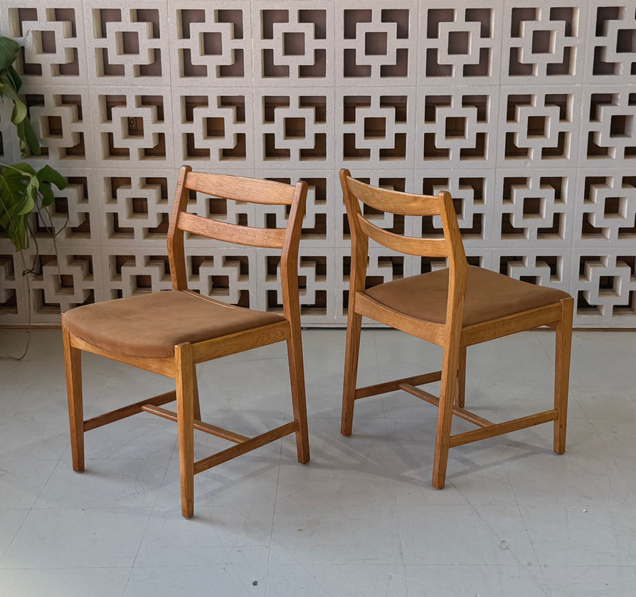 Four Erik Wørtz Dining Chairs in Oak