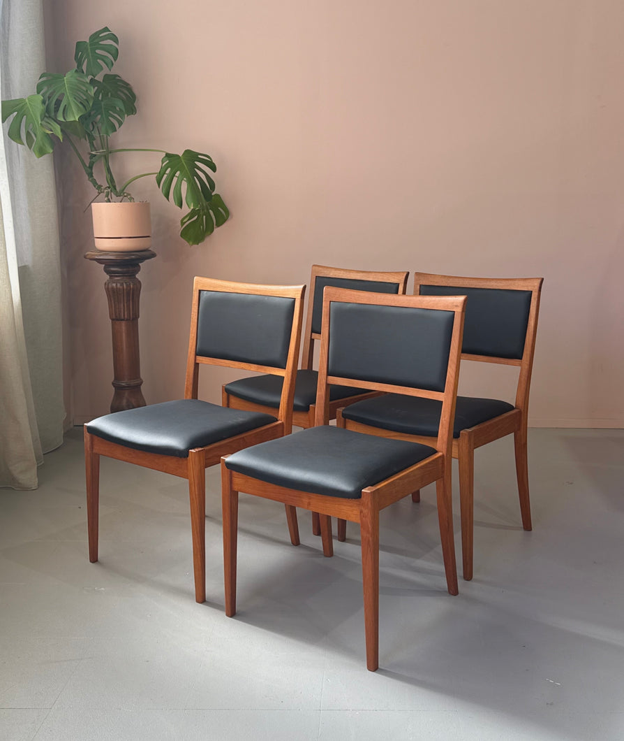 Four Parker 70 Dining Chairs in New Black Vinyl