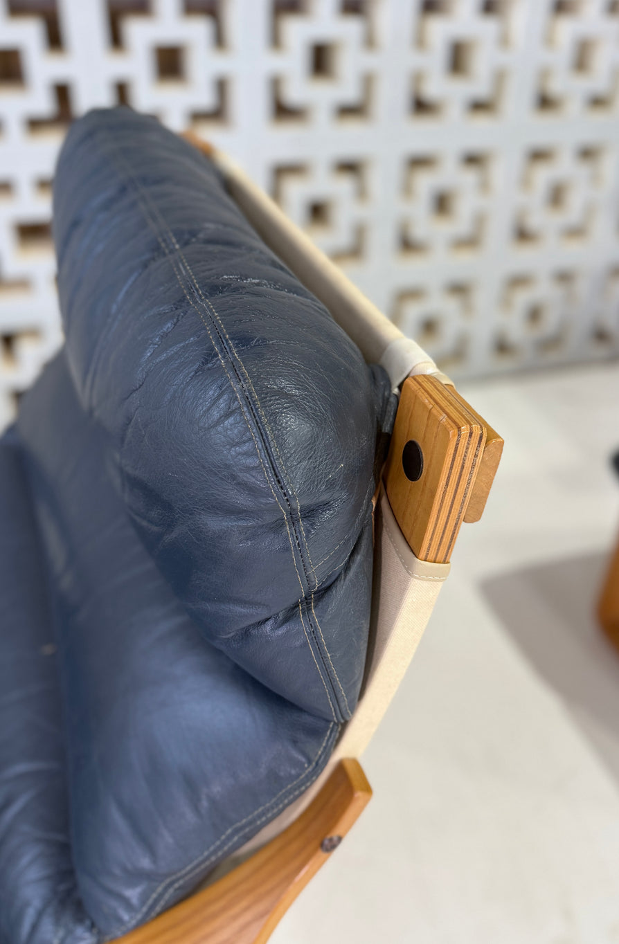 Tessa Stockholm Swivel Lounge Chair & Footstool in Blue Leather