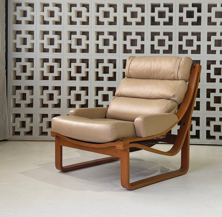Tessa T4 Lounge Chair in a Light Tan Leather