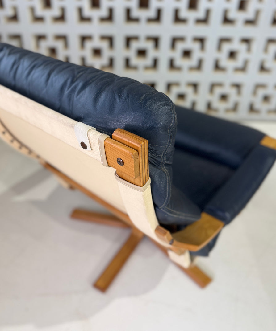 Tessa Stockholm Swivel Lounge Chair & Footstool in Blue Leather