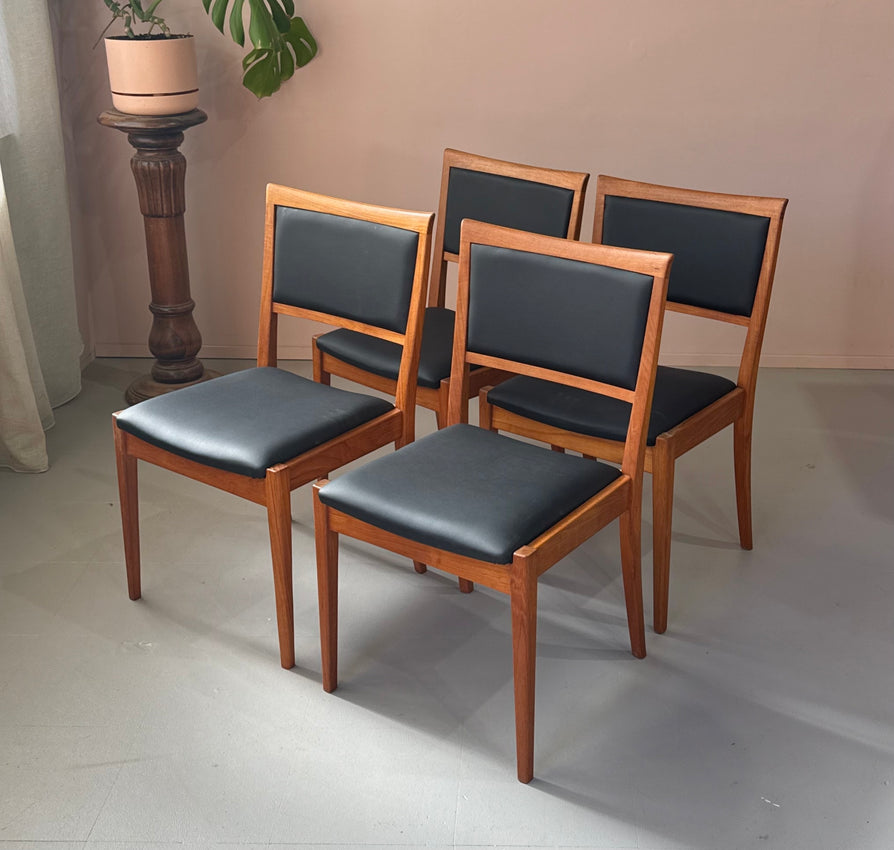 Four Parker 70 Dining Chairs in New Black Vinyl