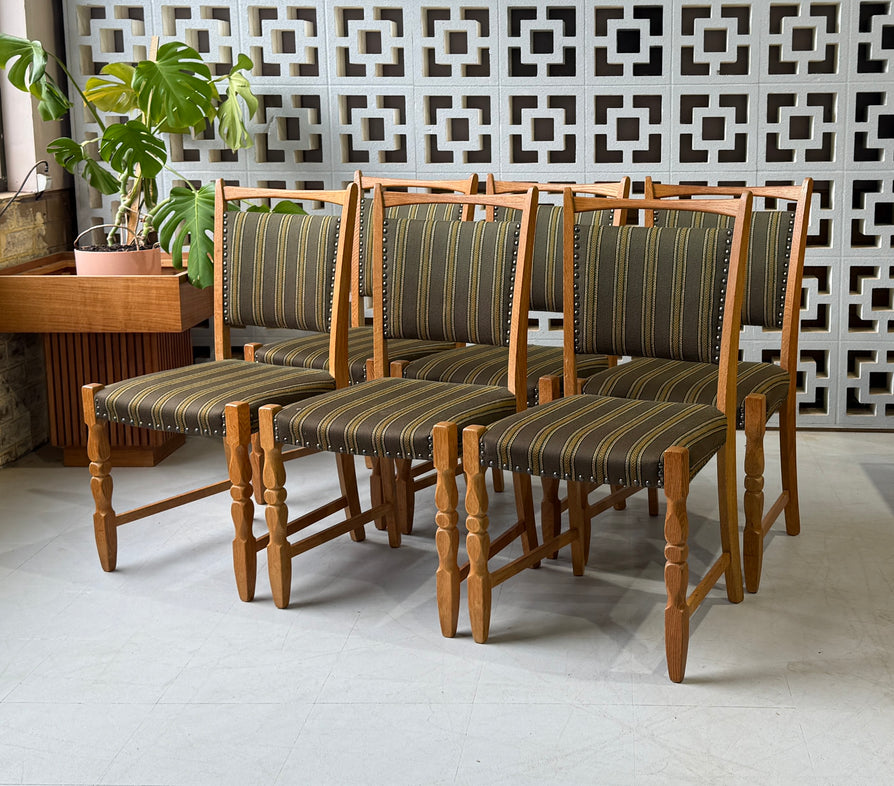 Six Henning Kjærnulf Dining Chairs in Oak
