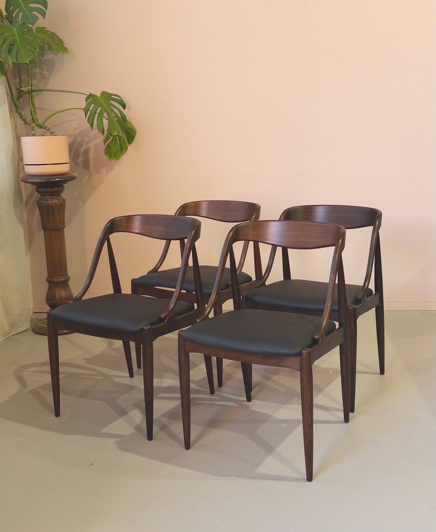 Four Johannes Andersen Model 16 Dining Chairs