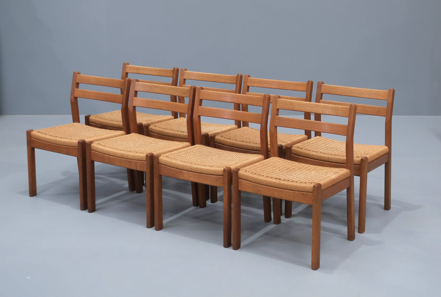 Eight Poul Volther Dining Chairs in European Oak and Papercord