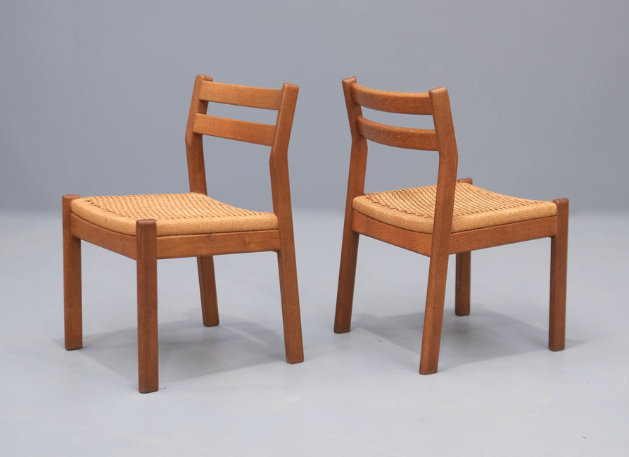 Eight Poul Volther Dining Chairs in European Oak and Papercord